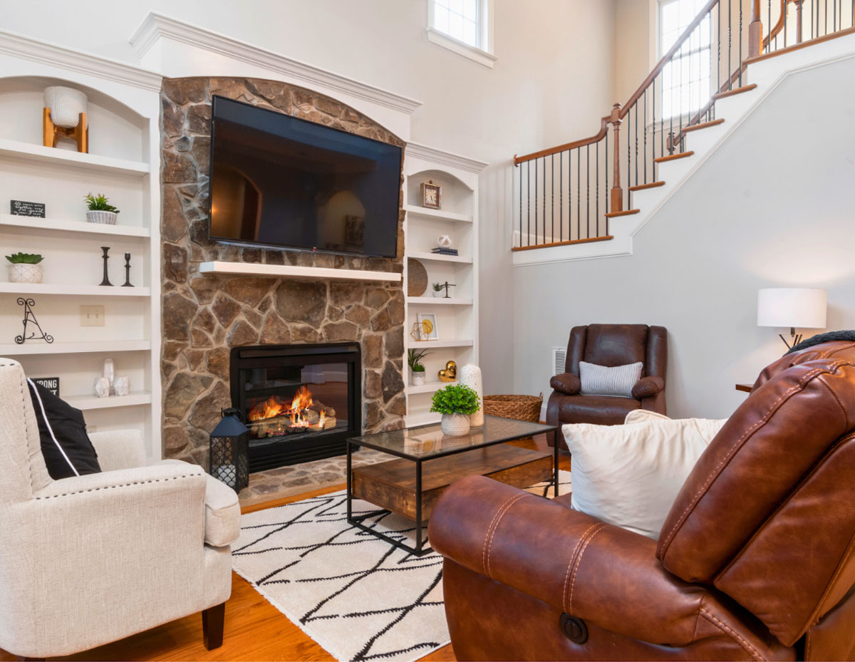 This living room has a minimalist feel, with little decor, clutter, or wall art. Everything is kept neat, uncluttered, and tucked away.