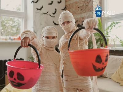 family wears mummy costumes